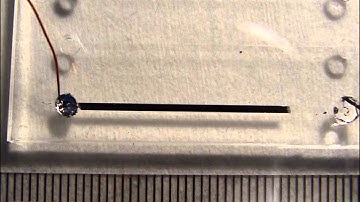 Liquid Metal Solves a Maze by Recapillarity