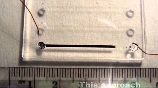 Liquid Metal Solves a Maze by Recapillarity