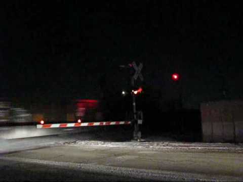 A pair of EJ&E SD38-2's and an EJ&E SW1200 lead the Line Train west - New Lenox, IL. 01/08/09