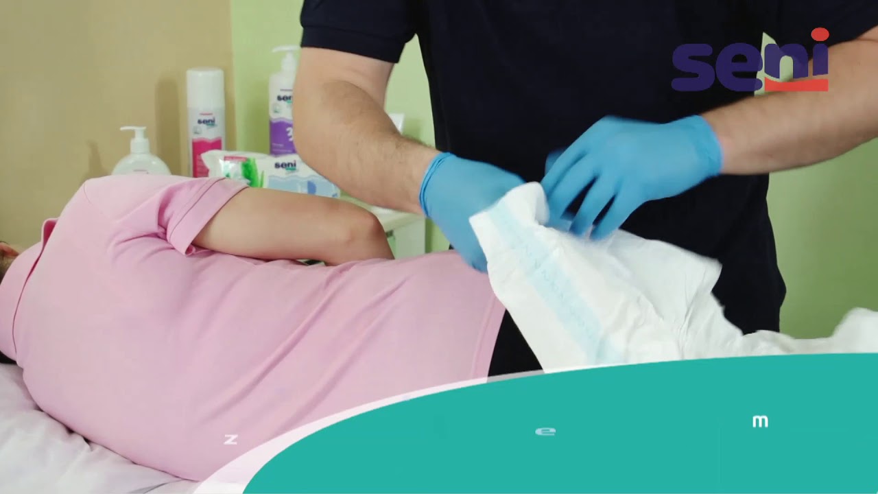 [DE] 03 Seni - Super Seni atmungsaktive Inkontinenzhosen Anwendung bei einer liegenden Person