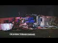Thousands in Oklahoma city clean up after massive tornado sweeps through area