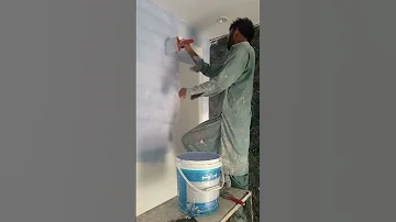 Applying A First Coat Of Emulsion Paint 