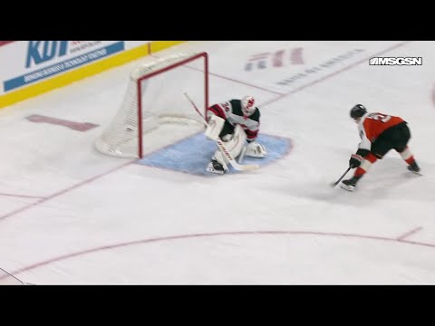 Matvei Michkov scores a goal against the New Jersey Devils