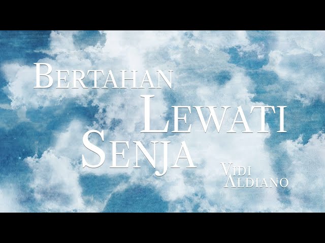 VIDI ALDIANO - BERTAHAN LEWATI SENJA (OFFICIAL LYRIC VIDEO) class=