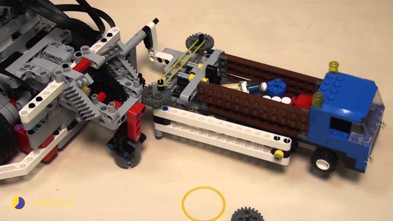 Rubber bands, gear wheels and motors attachment for solving FLL 2013