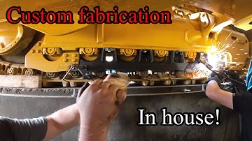 Customer wanted Rock Guards on his 755K Deere track loader so we delivered 100% from scratch