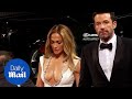 Jennifer Lopez graces red carpet in white gown with Ben Affleck