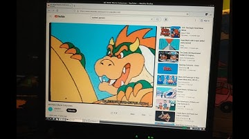 Installing 32-bit Debian 12 on an IBM Thinkpad T42 from 2004.