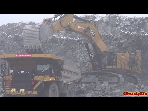 4K| CAT 6015 Loading Two CAT 777G's In A Quarry