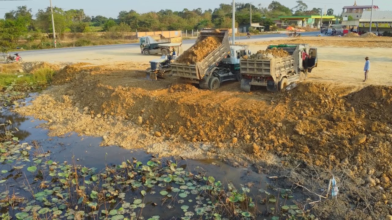 Water Transporting Rocks Amazing bulldozers push rocks into the water, transporting them to fill ...