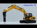 Norscot Caterpillar 323D L Excavator + CAT H120E S Hammer by