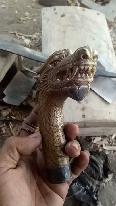 gagang golok ukir naga