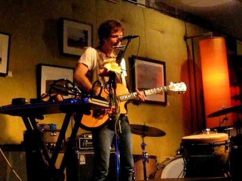 Lucas Carpenter covering Rilo Kiley's "More Adventurous" at Milkboy Coffee in Ardmore, PA on August 2, 2009.