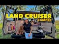 Testing our cozy land cruiser camper truck with my dog after furniture built