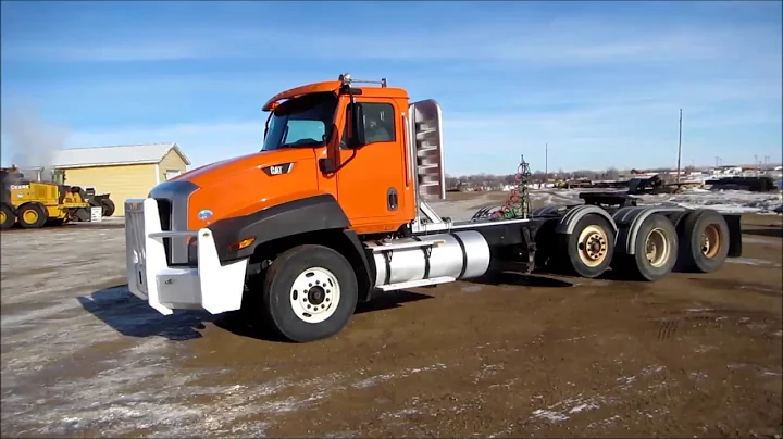 BigIron Auction DI1647 CAT 660 Truck with Pusher