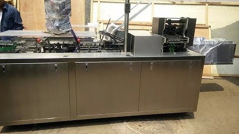 Automated glass bottle cartoning machine with leaflet inserting system box packer system video