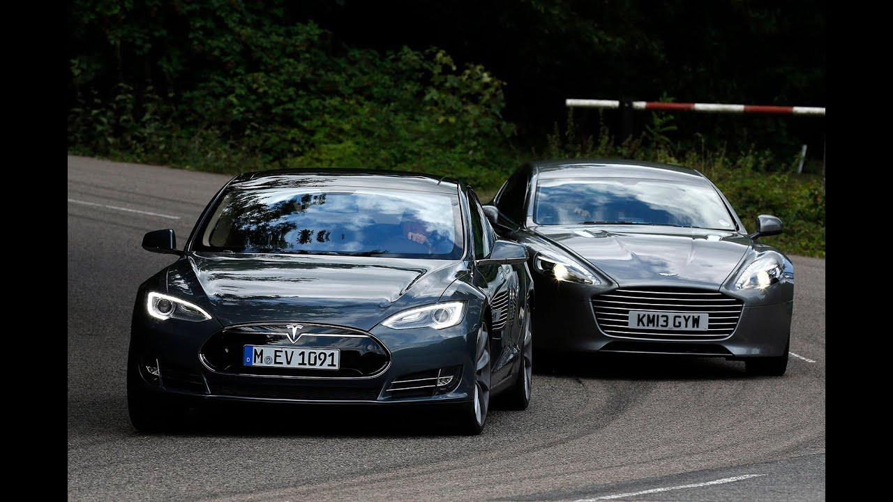 Tesla Model S Takes On The Aston Martin Rapide In Ultimate Tesla Model S Takes On The Aston Martin Rapide In Ultimate Luxury Saloon Battle You