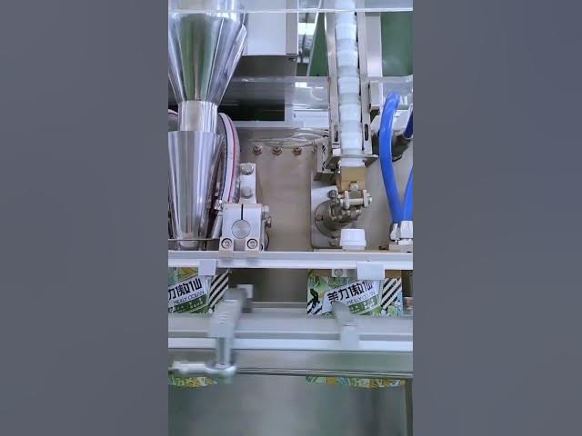 Suction nozzle bags filling and packing machine