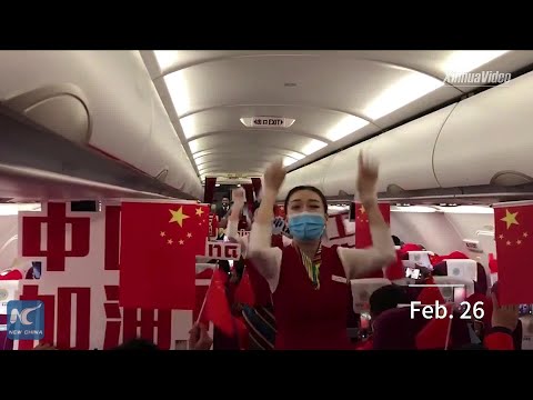 Flight attendants perform gesture dances for staff resuming work in Tibet, China