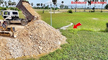 Best Dozer and Dump Truck Team Work Landfill Soil Leveling at Construction Site