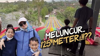 MELUNCUR 125 METER RAINBOW SLIDE FLOATING MARKET BANDUNG