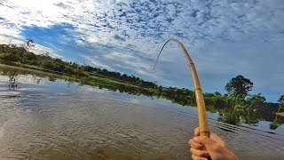 EXTREME FISHING! GIANT FISH IN BAMBOO ROD...
