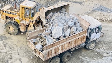 Massive CAT Loader Moving Tons of Stone | Dump Truck Loading at Quarry""Caterpillar Heavy Equipment💥
