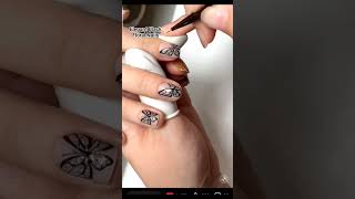 Soft nude nails with black flora#NailArt#FloralNails #ElegantNails#NudeNails #ChicStyle #BeautyTrend