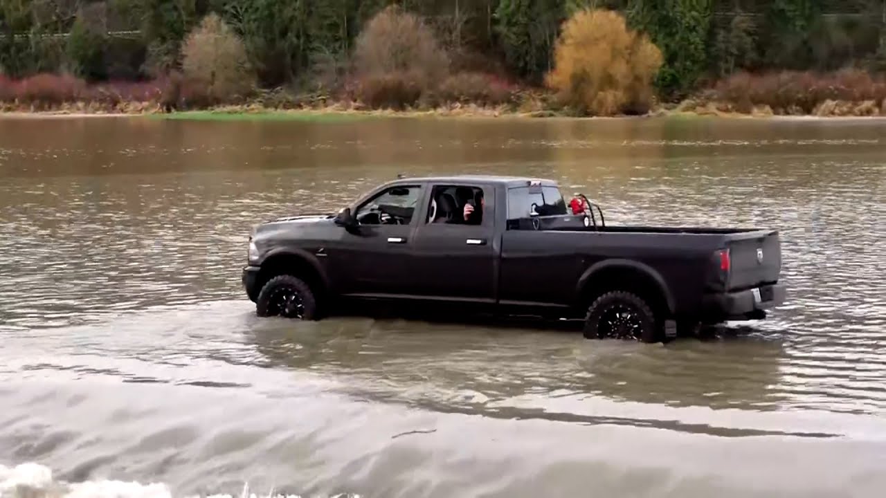 Drone video shows pickup driving through flooded Washington state road ...