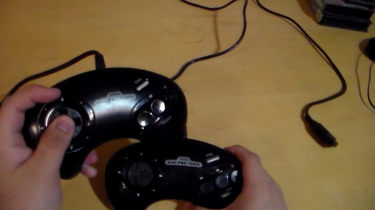 2 different types of Sega Genesis "Mega Drive" 3 button controllers