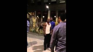 A fight between Blacks and Mexican on the street of Seattle