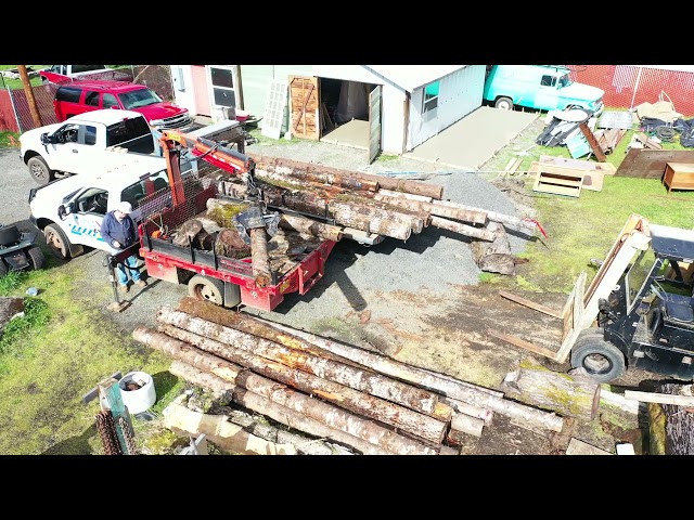 Aerial view of log unloading in Yamhill County