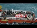 EN - Indonesian search team raises tail of crashed AirAsia plane, no black box found