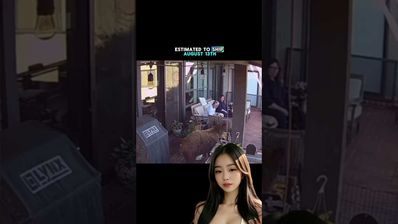 Bear sneaks up on couple! 