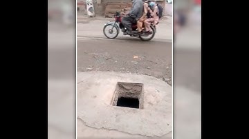 TARS Foundation | Covering of an open Mainhole on a busy road of Peshawar