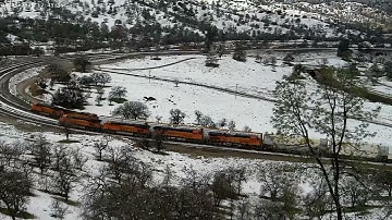 BNSF train meet at the Tehachapi Loop during Winter Storm