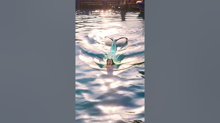 Mermaids cruising in agile way, like a dream elf in the sea