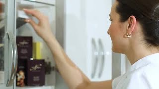 Taking Product From Cabinet Stock Video
