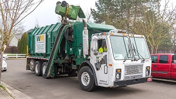Mack LE - Amrep Octagonal Side Load Garbage Truck