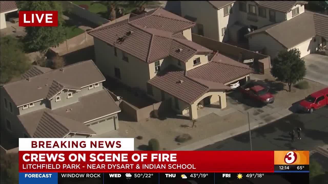 Avondale officer treated for smoke inhalation after house fire - YouTube