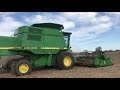 9500 John Deere combine cutting soybeans