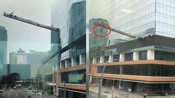 Rescue mission after dangerous winds leave worker dangling from skyscraper - Today News