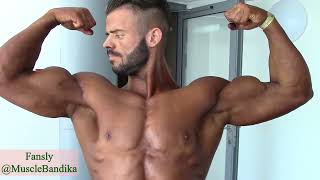 shredded contestant poses for me