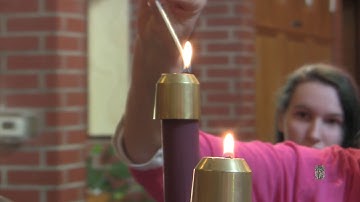 Lighting the Advent candle on the Third Sunday of Advent