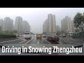 Driving in the first snow in Zhengzhou, Henan, China. 駕車旅行/自駕游在下首場雪中的中國河南省鄭州市