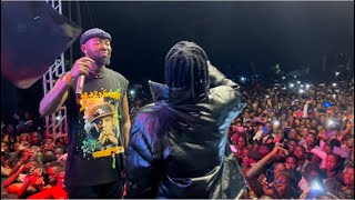 Eddy Kenzo surprises Makerere University students with Fik Fameica in the amid his performance.