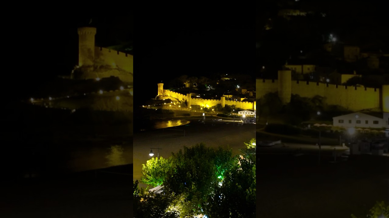 This ancient castle in Tossa de Mar, spain looks magical at night 