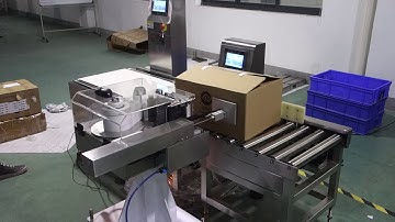 Online weighing labeling machine