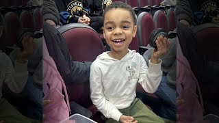 Hero hockey fan blocks puck from hitting 4-year-old boy