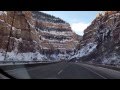 Tesla model s driving through the rocky mountains in colorado